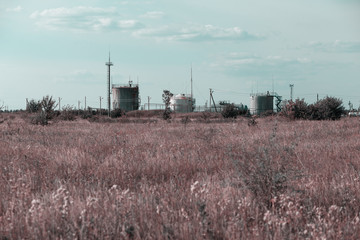 Fototapeta na wymiar oil tanks in the field