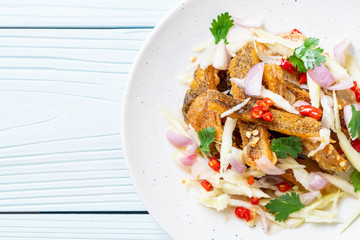 crispy gourami fish with spicy salad