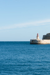 Obraz premium Lighthouse, Ricasoli East Breakwater, Malta