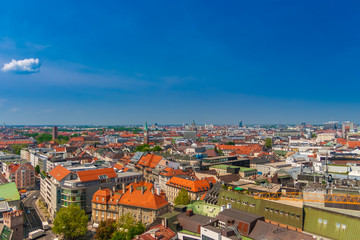 Nice aerial view of Munich's interesting cityscape on a nice sunny day with a blue sky in Bavaria, Germany. The downtown of Munich is one of the most popular tourist destination in Germany.