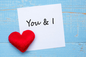 YES,I DOword on paper note with red  heart shape decoration on blue wooden table background. Love, Wedding, Romantic and Happy Valentine&rsquo; s day holiday concept