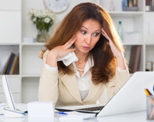 Woman is upset because of complicated issue with project