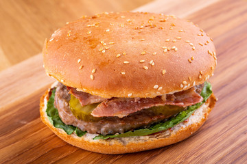 Hamburger with a boiled turkey and roll with sesame 