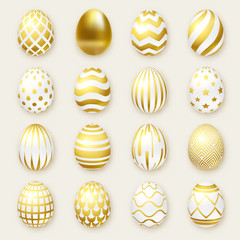 Set of ornate golden realistic eggs on light background. Easter collection