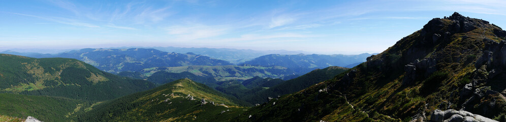 Fototapeta na wymiar wide panoramic view of the Carpathians Mountains in summer