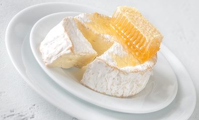 Camembert cheese with honeycombs