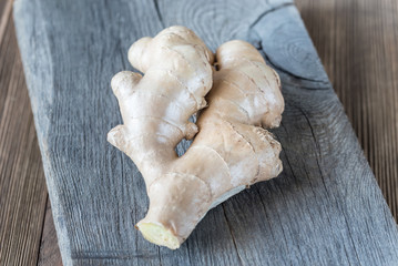 Fresh ginger on the wooden board