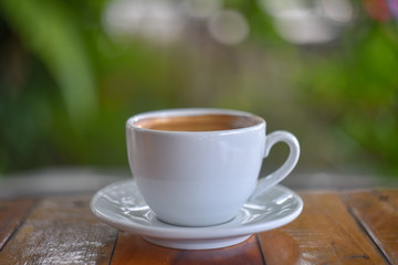 Fototapeta na wymiar Coffee in a white cup