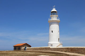 Fototapeta na wymiar lighthouse against the blue sky