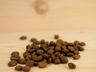 Coffee beans on wooden floors.