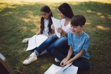 Group of children with teacher in park