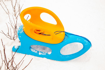 yellow-blue sled in the snow, winter