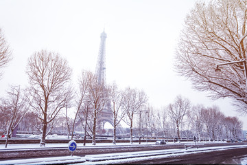 Snow-covered streets of Paris and the Eiffel Tower