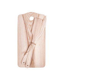 Wooden cutting board with wooden spoon and knife