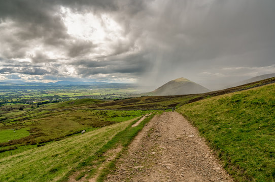 North Pennines landscape, looking at the rain clouds over Dufton Pike in Cumbria, England, UK