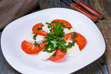 Caprese salad with mozzarella and tomato