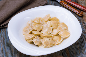 Dumplings with sour cream