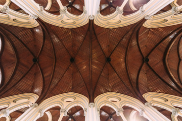 Cathedral of Saint Mary of the Assumption wooden arch ceiling with sunlight.