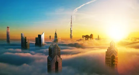 Foto op Plexiglas Dubai zonsondergang uitzicht op het centrum bedekt met wolken © Jag_cz