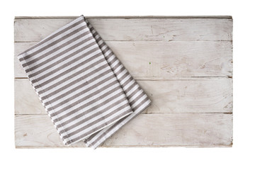 top view of kitchen cloth on white wooden board isolated on white background
