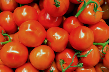 lots of fresh red tomatoes. background texture