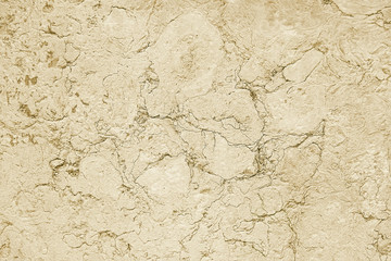 Old beige stone granite wall background texture