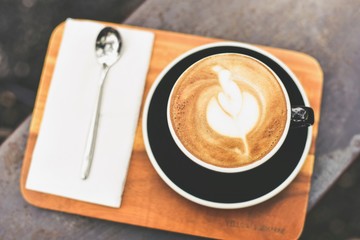 A Cup of Aromatic Hot Coffee with Latte Art
