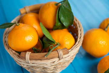 Tangerines in a wicker basket