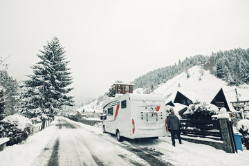 campervan caravan vehicle for van life holiday on camper van journey camping in winter mountains...