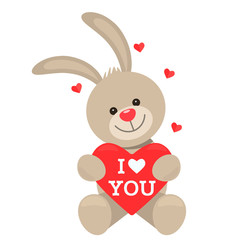 Funny character Rabbit holds in his paws a big heart with the words I love you. The concept of Valentine's Day, wedding, Easter.