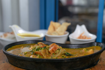 Close up of shrimps curry in a pan