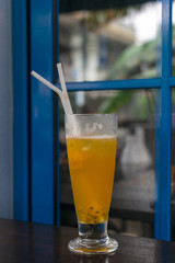 Iced tea, lemonade, cocktail with passion fruit