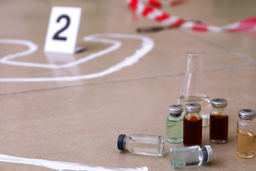 Crime scene with victim silhouette and evidences