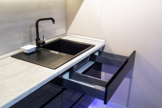Kitchen cabinets with milled groove instead of classic handles
