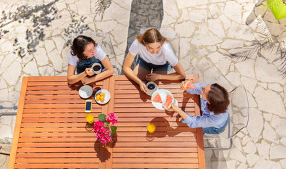 Above view of outdoor family breakfast together