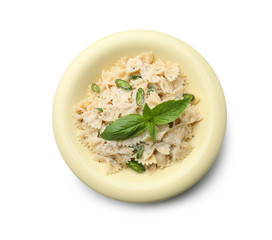 Plate with tasty pasta on white background