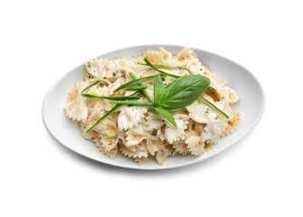 Plate with tasty pasta on white background