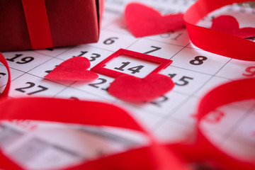 Valentine's day calendar with the date 14, hearts and roses