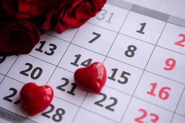 Valentine's day calendar with the date 14, hearts and roses