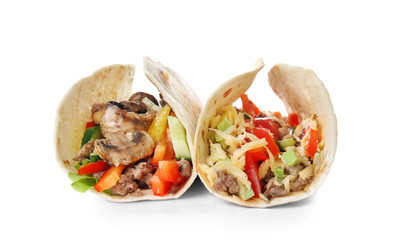 Tasty tacos on white background