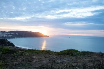Crédence de cuisine en verre imprimé Plage de Baker, San Francisco baker beach in san francisco at sunset with calm sea and sunlit clouds