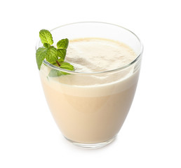Glass of tasty milkshake on white background