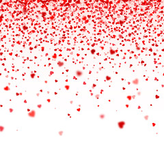 Fototapeta na wymiar Valentines Day Falling Red Blurred Hearts On White Background. Heart Shaped Paper Confetti. February 14 Greeting Card.