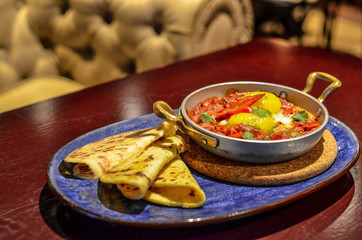 Breakfast. Sunny side-up eggs with vegetables