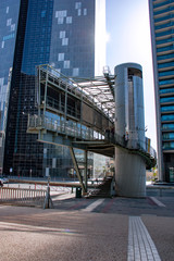 Pedestrian bridge across the road in the modern city