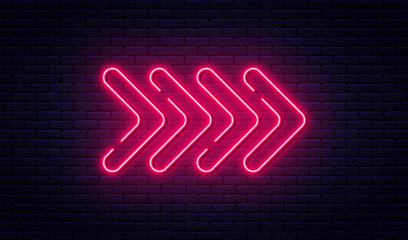Neon arrow sign. Glowing neon arrow pointer on brick wall background. Retro signboard with bright neon tubes