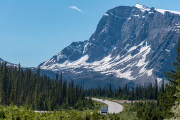 Road trip with a great view of big mountain and blue sky in Alberta, Canada - 242530491