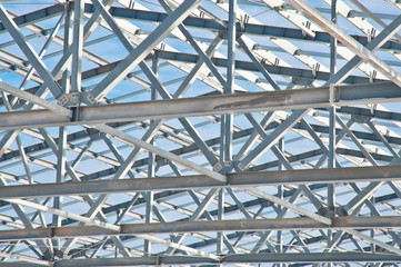 Fototapeta premium Structure of building. Steel construction on sky background