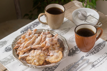 Angel wings biscuits, a traditional European sweet dish for carnival. Rustic style.