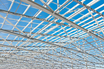 Fototapeta premium Structure of building. Steel construction on sky background